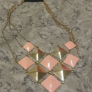 Peach and goldtone necklace